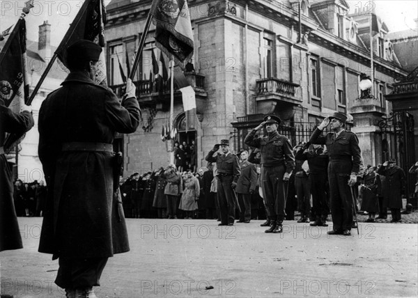 Allied Generals salute colors in Belfort (France) November 1944.