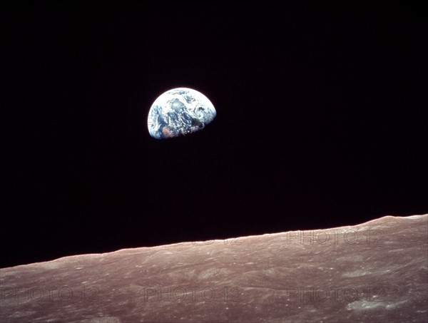 Earth rising during Apollo 11 mission around the Moon (July 1969)