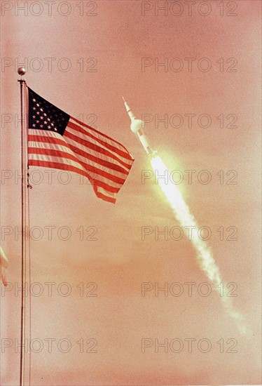 The American Flag  heralds the flight of Apollo XI (July 16, 1969)