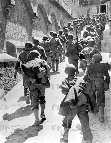 U.S troops march through St Angelo d'Brolo (Sicily) on their way to Messina (Aug.19,1943)