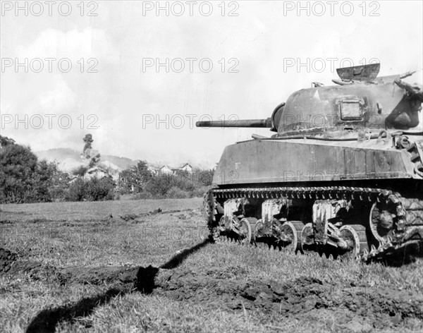 U.S. tank blasts German-fortified building in Dombasle (France), Autumn 1944