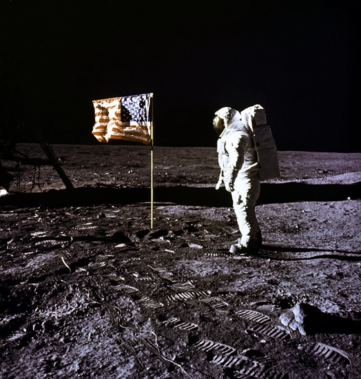 Astronaut Edwin E. Aldrin poses for a photograph beside the deployed U.S Flag (on Moon-July 20,1969)
