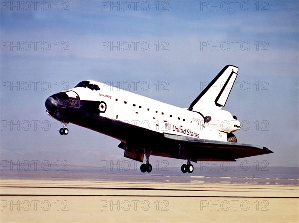 The Space Shuttle Discovery prepares to touchdown on a Mojave Desert lake, October 3,1988