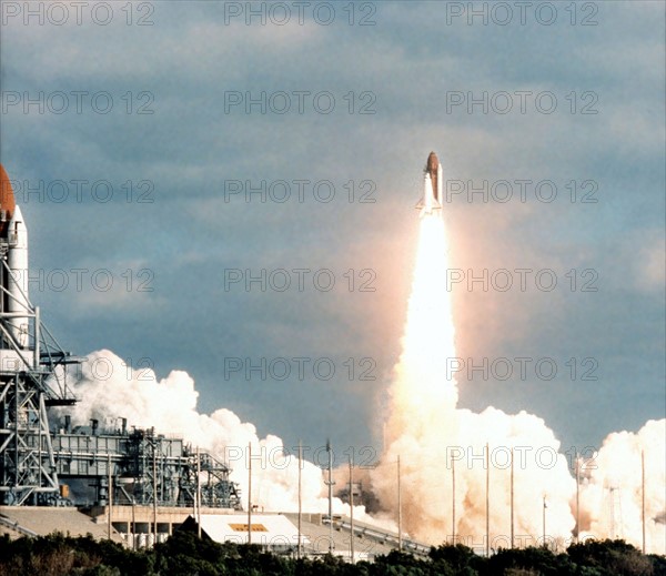 The Space Shuttle Columbia  "watches" the Space Shuttle Discovery lift off, April 24,1990