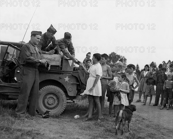 Cokes and doughnuts for French children (August 7, 1945)