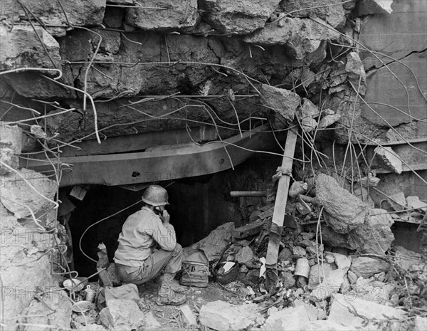 German pillbox becomes American telephone booth  in France (Autumn 1944)