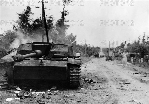 Wrecked German tanks and vehicles on the Normandy battlefront (June 1944)