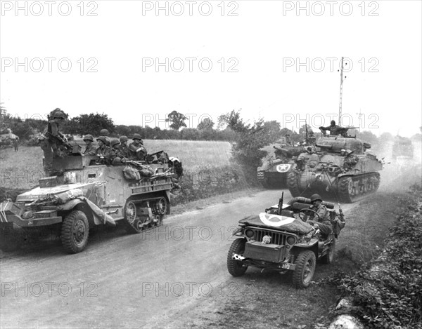 American armor roars toward Concarneau in Brittany, August 1944