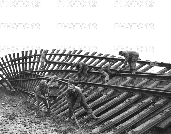 American engineers working on the French railway in Bensdorf, December 3, 1944