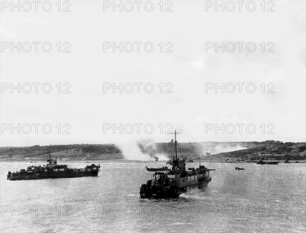 American landing craft approaching a beachhead  on the Normandy coast, June 6, 1944