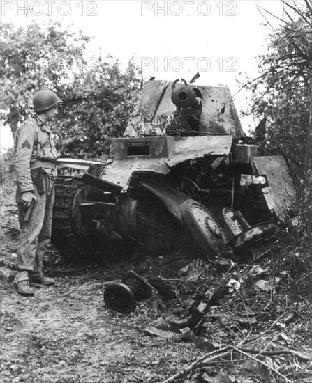 German gun knocked out in  Normandy, July 1944