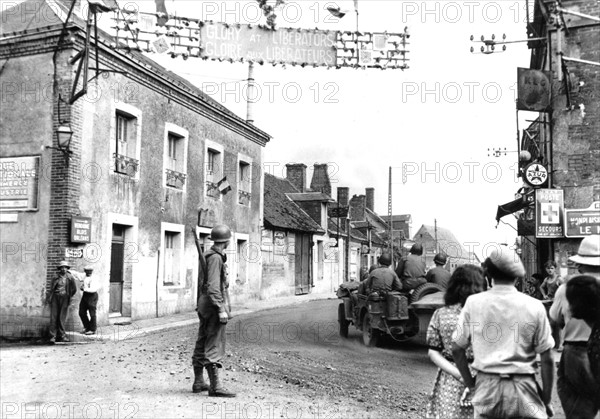 French village cheers U.S. troops on road to Vendôme, August 1944