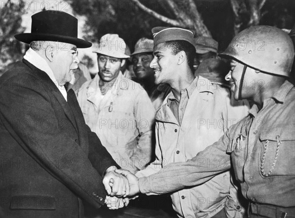 Bishop greets Black troops in Italy, December 23, 1943