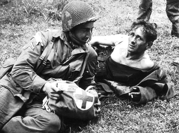 First aid for German prisoners in Normandy beachhead, June 1944