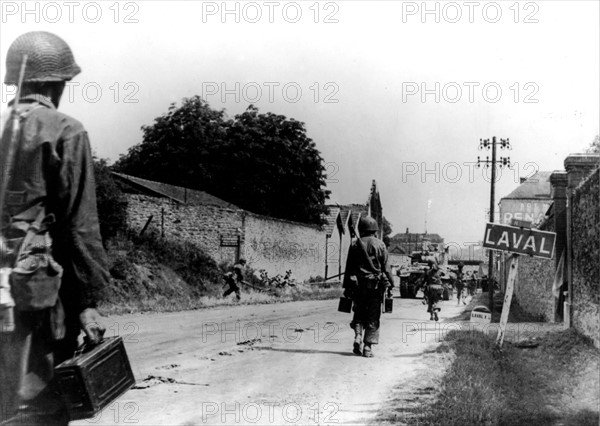 American troops enter Laval  during drive through France (August 6, 1944)