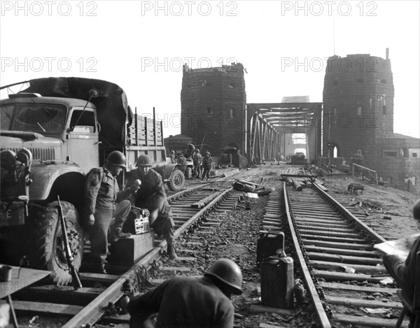 Two members of the U.S. Army record for broadcast purposes at Remagen (Germany) March 1945