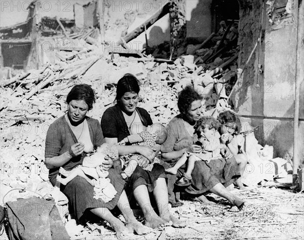 Italian women on rubble