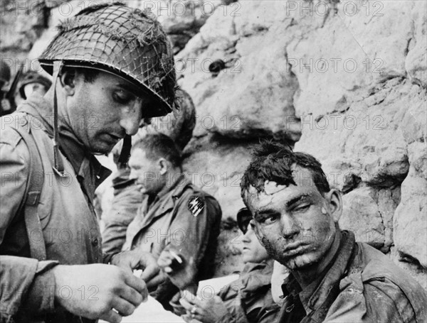 US soldiers on a Normandy Beach, June 6, 1944