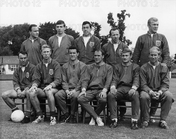 The players of the English national soccer team pose for a group photo on a pitch at  Wembley Stadium, London, Great Britain, 16 June 1966, before the 1966 Soccer World Cup game against Mexico. England won the game by a score of  2-0. Standing (L-R): George Cohen, Martin Peters, Gordon Banks, Nobby Stiles, Bobby Moore; Sitting (L-R): Jimmy Greaves, Jack Charlton, Terry Paine, Ramon Wilson, Roger Hunt, Bobby Charlton. The British team won the 1966 Soccer World Championship.