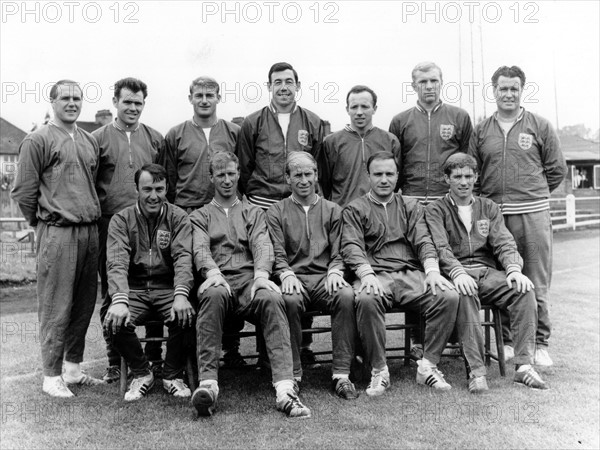 The players of the English national soccer team pose together for a group picture in London, UK, 11 July 1966. England prepared for the 1966 World Cup opening game England against Uruguay. Standing (L-R): Ray Wilson, John Connelly, Roger Hunt, Gordon Banks, Nobby Stiles, Bobby Moore, Co-coach Harold Shepherdson; sitting (L-R): Jimmy Greaves, Jack Charlton, Bobby Charlton, George Cohen, Alan Ball.