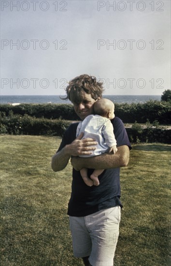 Robert (Bobby) Kennedy with one of his children.