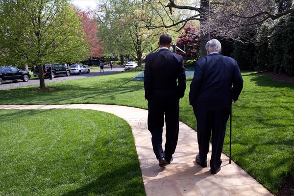 President Obama escorts Sen. Edward Kenn...........