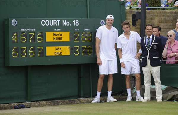 Wimbledon  Championships  Day FOUR 24/6/10

John Isner v Nicolas Mahut
John Isner ,Nicolas Mahut and Umpire Mohammed Lahyani