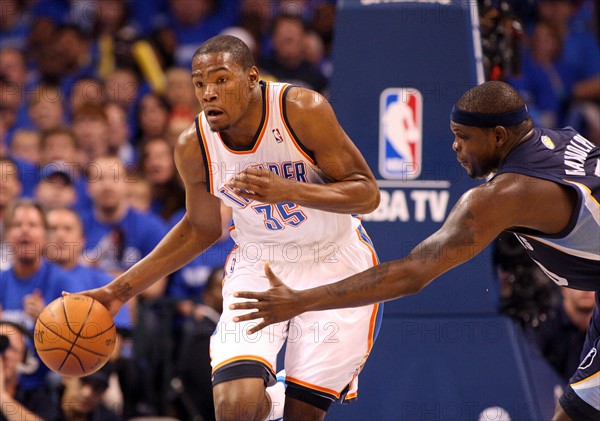 01 May 2011: Thunder forward Kevin Durant (35) runs with the ball past Memphis forward Zach Randolph (50) during game 1 of the second round of the NBA playoffs where the Oklahoma City Thunder are taking on the Memphis Grizzlies at the Oklahoma City Arena in Oklahoma City, OK.