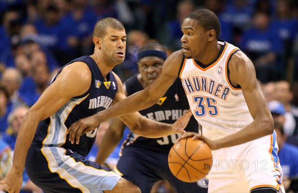 01 May 2011: Thunder forward Kevin Durant (35) goes around Memphis forward Shane Battier (31) during game 1 of the second round of the NBA playoffs where the Oklahoma City Thunder are taking on the Memphis Grizzlies at the Oklahoma City Arena in Oklahoma City, OK.