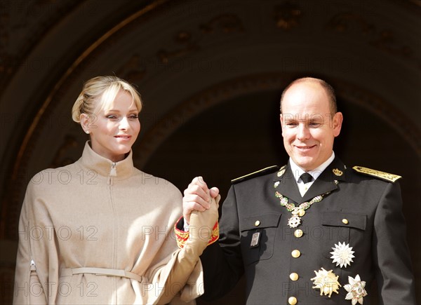 Prince Albert II of Monaco and his wife Princess Charlene greet from the balcony of the palace of Monaco, as part of the official ceremonies for the Monaco National Day, 19 November 2011, in Monaco. Photo: Albert Nieboer / NETHERLANDS OUT