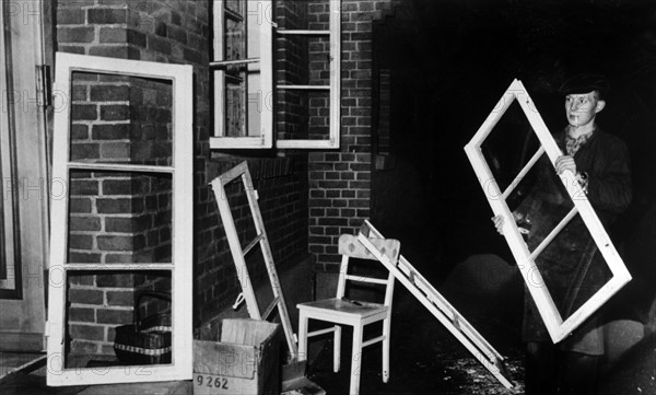 British tank damages house