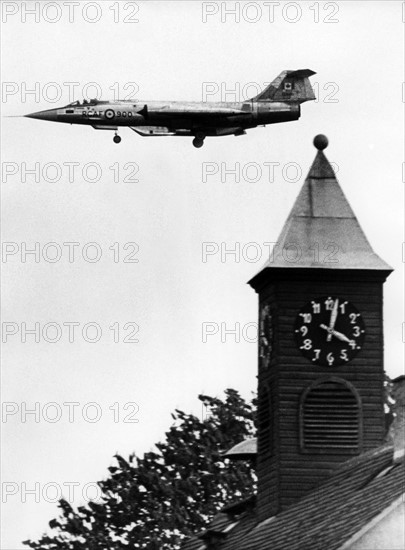 Canadian military airplane flies across small town in Southern Germany