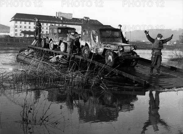 French pioneers are carrying jeeps across the Main.