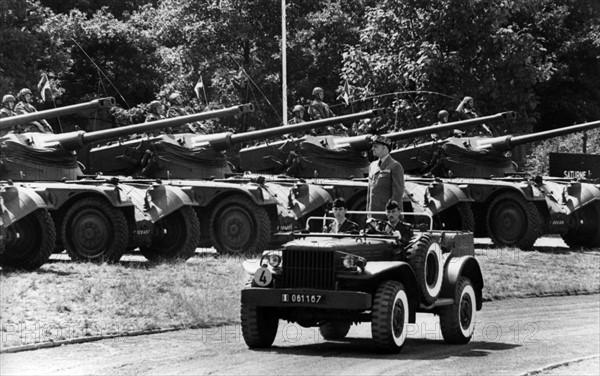 The French military governor Jean Lacomme at the parade on the occasion of the French national holiday