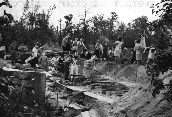 Post-war era - Trümmerfrauen ("rubble women")