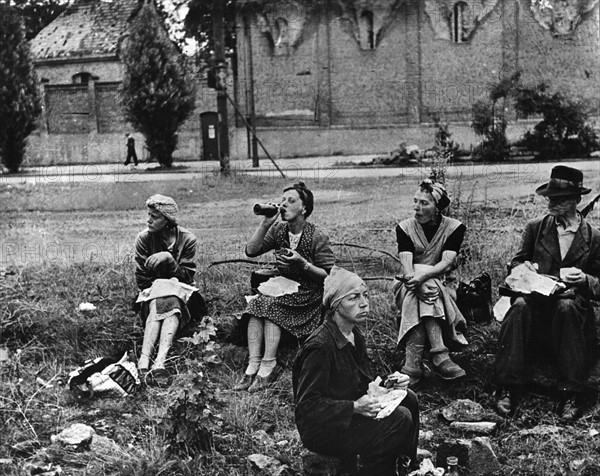 Post-war era - Trümmerfrauen ("rubble women")