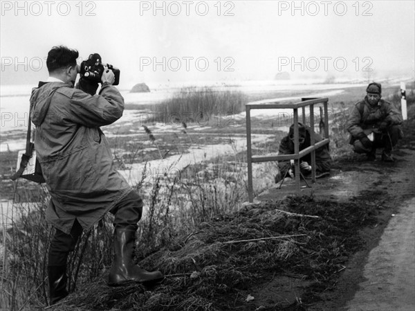 Japanese camera team films manoeuvre of US army