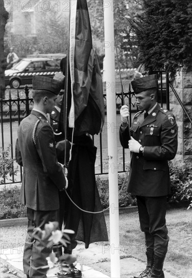 Flag changing at the US town major's in Berlin