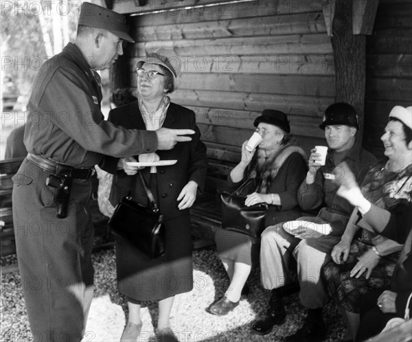 US General Hartel welcomes first visitors in American refuge huts in Berlin Grunewald