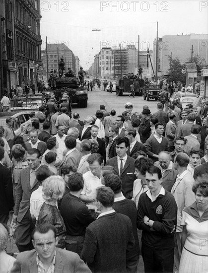 West Berlins at Sunday stroll at the Berlin Wall