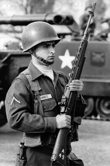 U.S. soldier in Germany in front of an armoured personnel carrier