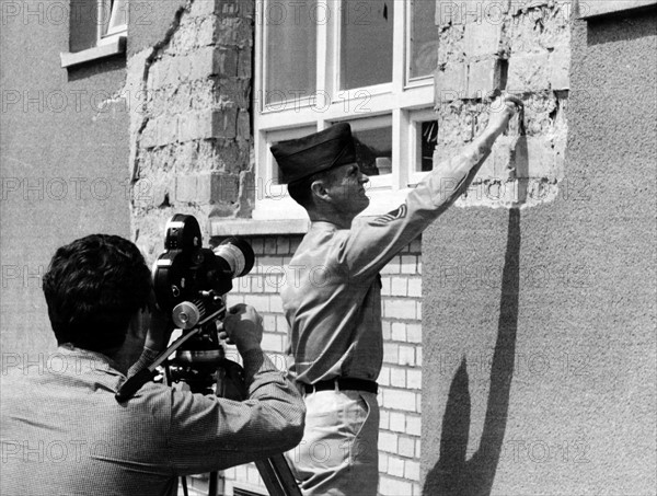 Relatives of the US Army leaving decrepit apartments