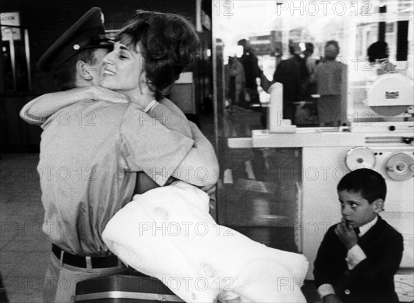 US soldier is welcomed by his family at Airport Frankfurt