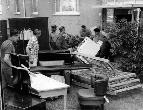 Relatives of the US Army leaving decrepit apartments