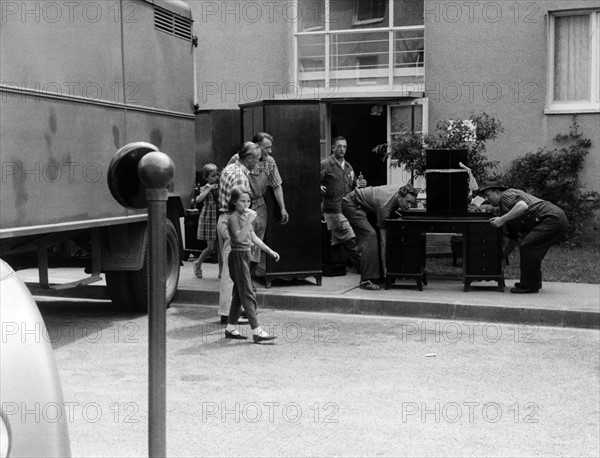 Relatives of the US Army leaving decrepit apartments