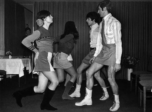 A group of young models, male and female, present themselves in mini skirts on 6 December 1966 in Munich. Following ancient Roman and Scottish models, clever fashion producers tried to make skirts for men popular during the 1960s - with moderate success.