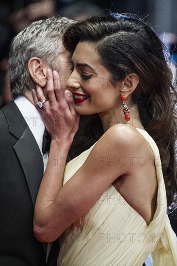 George Clooney and Amal Clooney attends the premiere for "Money Monster" at the Palais de Festival for the 69th Cannes Film Festival.