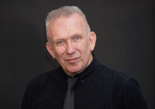 Fashion designer Gaultier presents donation to Aids charity