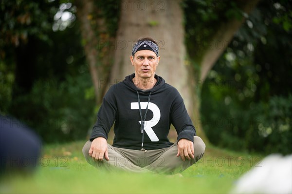 Actor Ralf Bauer gives a yoga lesson