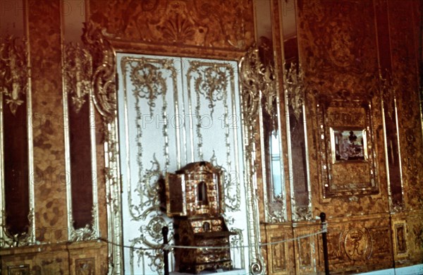 (dpa files) - A photo taken secretly by a German soldier during a visit shows the original Amber Room which was exhibited between 1941 and 1944 at the castle in Kaliningrad, photographed around 1942/43. His pictures are today the only surviving colour photos of the famous amber room. - The Amber Room was a present from Prussia to Russia, offered by the king of Prussia to Russian Czar Peter the Great in 1716. Catherine the Great later moved it from the Winter Palace in St. Petersburg to her new summer abode in Tsarskoye Selo in 1770. When Germany invaded the Soviet Union in 1941, the German troops shipped the amber room to Koenigsberg, Germany (today Kaliningrad). The room was eventually lost in the chaos of World War II. The former Soviet Union began the reconstruction of a replica of the room in 1979. The finishing stage of the project was financed by the German Ruhrgas AG with 3 million Euro. As a work of art the room was considered to be the eighth wonder of the world. The ceremonia...